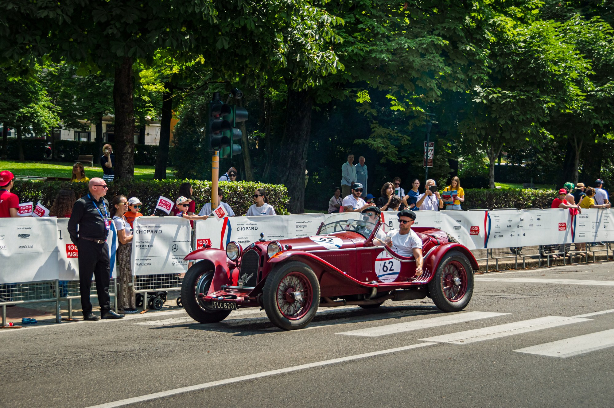 Alfa Romeo 8C 2300 crossing the finish among spectators